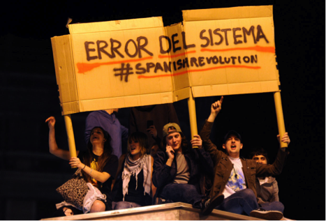 Networking Knowledge: Protest and the New Media Ecology. The issue cover pictures spanish protesters holding banner: ERROR DEL SISTEMA